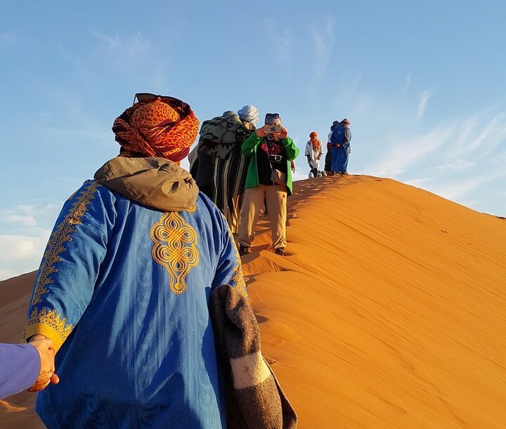 helping hand, golden sands, colorful, humanity, sahara, climb, hold on, together, snapshot, morocco, africa, blue help, blue human, blue together, sahara, morocco, morocco, morocco, morocco, morocco